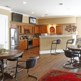 a community kitchen with tables and chairs