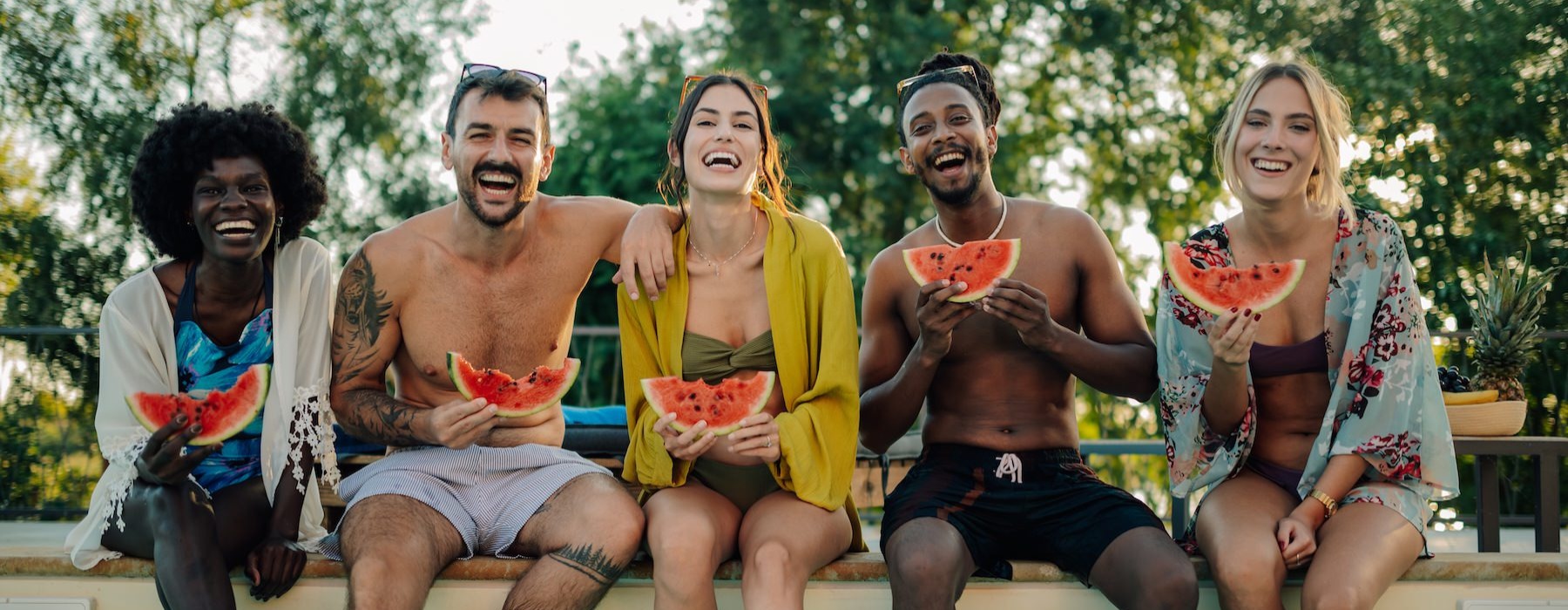 a group of people sitting in a pool